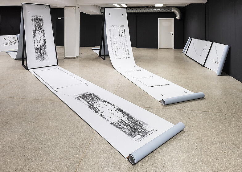 Elisabeth Kramer, exit strategies/ from the series moving stereotypes, xylography/relief print on poster paper (blueback), printing ink, wood, varnish, 91 x 3000 cm, 2025, photo: Otto Saxinger